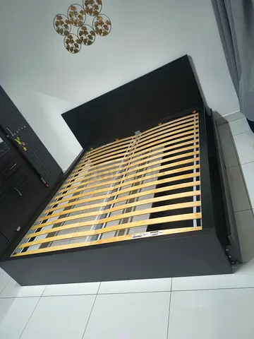 Upgrade your bedroom with a flawless, king-size IKEA Malam bed and stain-free mattress.