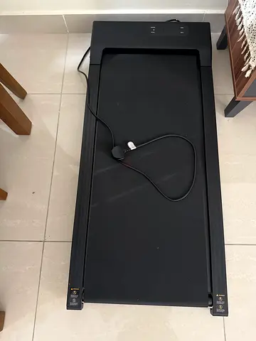 Compact treadmill with wheels — barely used, perfect for home