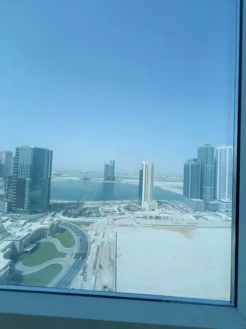 Beautiful 1BR Apartment for Rent in Al Mamzar, Sharjah. 2 Bathrooms, Balcony, Sea View, Central A/C, Free Parking, Prime Location.