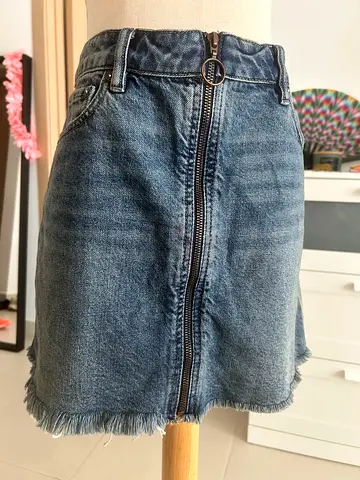 Denim mini skirt with front zipper and frayed hem - size 30