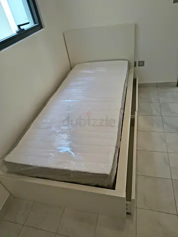 IKEA Malam single bed (90x200) with two handy storage drawers and a flawless mattress.