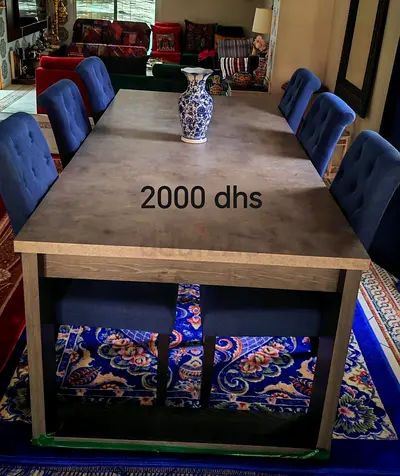 6-seater dining table with chairs - solid look, good condition (2000 AED)