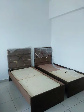 Pair of single beds with headboards — good condition, ready to use