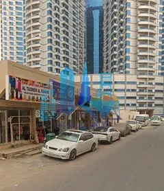 commercial / Invested shop and Land for sale in very good location in the heart of Ajman