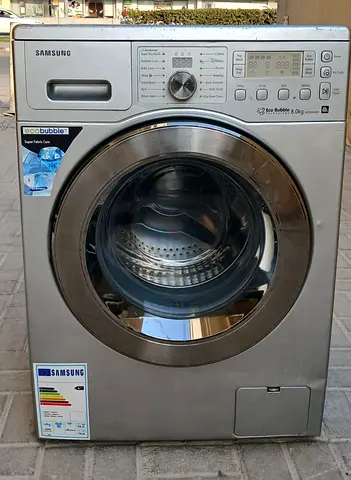 this is 8kg Samsung washing machine, eco bubble technology, working properly, its color is silver.