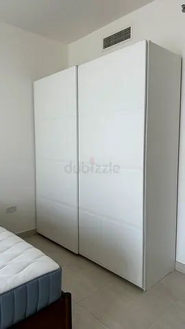 IKEA white sliding door wardrobe - 2 panels, excellent condition