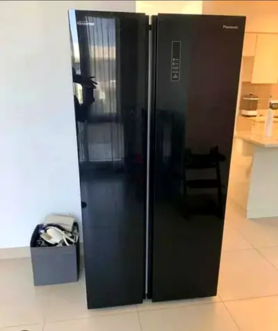 Black Side-by-Side Panasonic Refrigerator - Good Condition