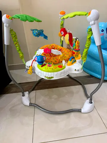 Baby Jumper/Activity Center with Toys and Lights - Good Condition