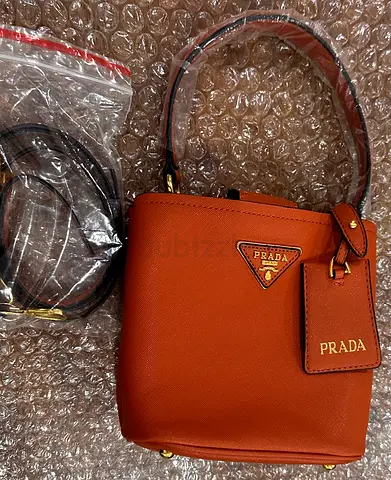Prada small saffiano leather bucket bag - brown (with strap)Never used DESIGNER INSPIRED
