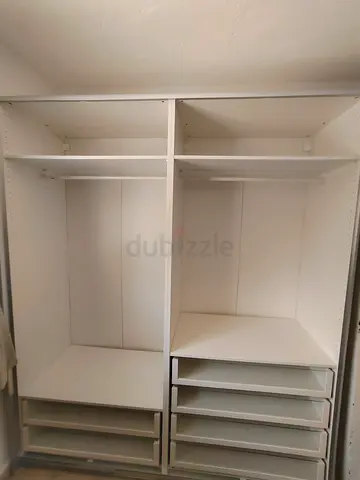 White Built-in Wardrobe Unit with Shelves and Drawers