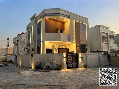 Luxury villa for sale in Al Yasmin with a modern design and high-end finishes, including air conditioning, ready for immediate occupancy