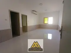 Two-bedroom apartment for annual rent in Al Rawda 2, Ajman. Balcony, 2 bathrooms, divided kitchen, s