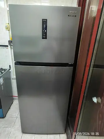 Sharp double-door refrigerator with freezer — good working condition