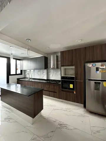 Modern wooden kitchen island — fully fitted cabinets and storage