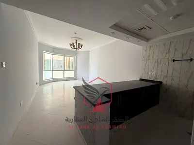 Annual rent apartment in one of the most beautiful towers in Sharjah, featuring an open American kitchen and air conditioning covered by the owner.