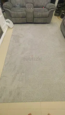 Light grey modern patterned area rug - good condition
