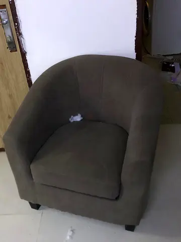 Brown upholstered tub armchair - good for living room