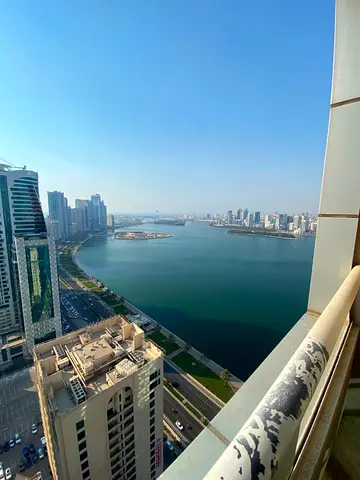 2-Bedroom Apartment with Living Room for Rent in Al Majaz 3 | Full Lake View | Parking, Gym, Pool | AED 60,000