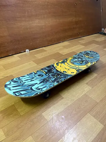 Used street skateboard with graphic deck - Very good condition