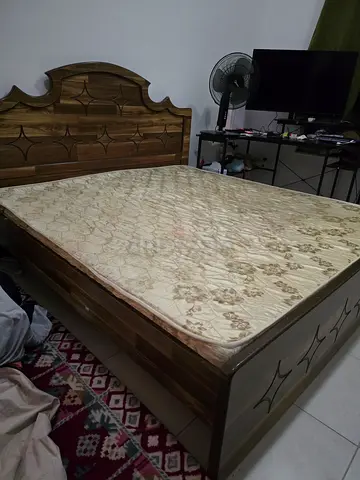 Solid wooden double bed with mattress – good condition