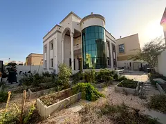 Luxury villa for sale in Al Yasmin, opposite a mosque and behind Al Hamidiya Park | Central air cond