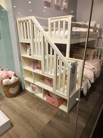White wooden bunk bed with storage stairs - good condition. Come with two matresses
