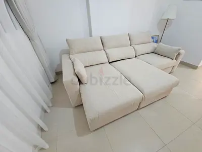 Eskilstuna L shape sofa bed with storage