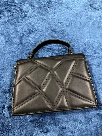Black leather crossbody bag with gold hardware - compact wallet style