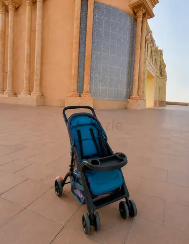 Lightweight teal baby stroller - single seat, foldable, with tray excellent quality