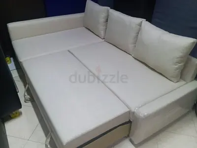 Beige L-shaped Sofa Bed with Storage — Good Condition