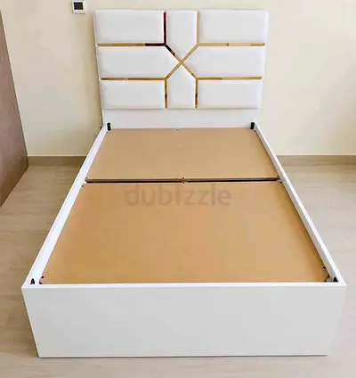 double white platform bed frame with padded headboard (good quality )