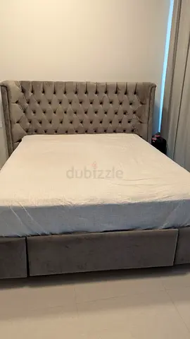 Queen size upholstered bed with storage