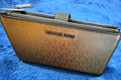 Michael KORS silver logo zipped wristlet/ clutch — BRAND NEW never used
