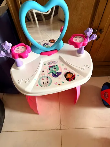 This is a Smoby Gabby's Dollhouse 2-in-1 Dressing Table, featuring a prominent heart-shaped mirror.