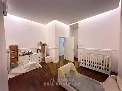 Villa for sale in Al Yasmeen, Ajman, with an area of 3,200 sq ft, 3 master bedrooms, open majlis (living room), kitchen with pantry, maid's room, si