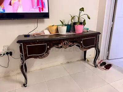 Elegant Wooden Console Table with Silver Accents