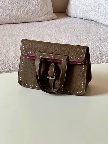 Hermess Small olive green leather handbag with front buckle detail