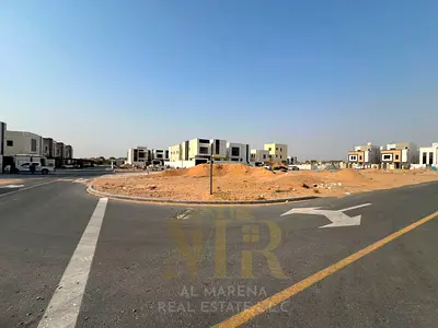 Residential land for sale in Al Helio 2 – Ajman | Corner plot | Area 306 m² ≈ 3,300 ft² | Permit for ground + 2 floors | Prime location | Price AED 80
