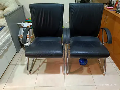 Pair of Black Leather Visitor Chairs with Chrome Base