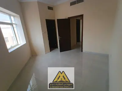 One-bedroom apartment for annual rent in Al Alia, Ajman. New building, 2 bathrooms, central AC, nea