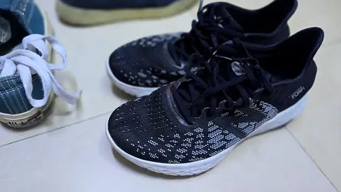 Black running sneakers - lightly used, size unknown