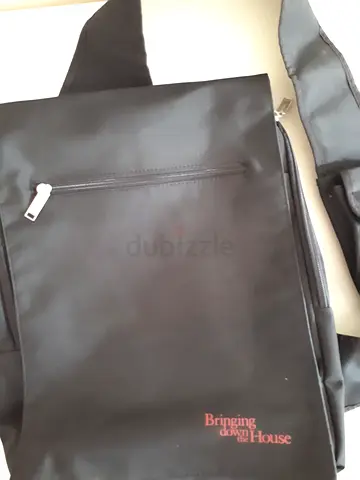 Black casual shoulder backpack with front zip pocket, Brand New