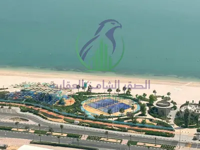 One bedroom apartment for annual rent in Al Mamzar Sharjah free gym free swimming pool free parking laundry room and storage room balcony sea view spa