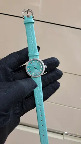 Turquoise women's wristwatch with crystal bezel and leather strap