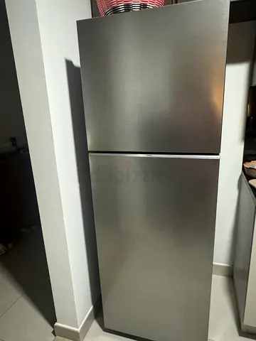 Compact stainless steel refrigerator - great condition - model 2024
