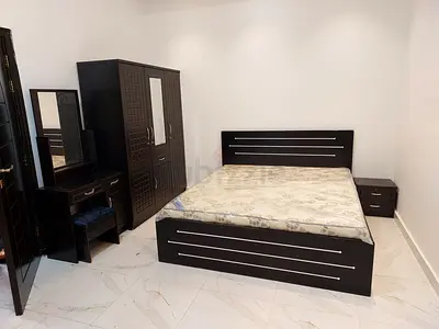 Dark wood queen bed with wardrobe, dresser and bedside table - set