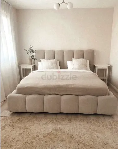Beige Upholstered King Bed with Padded Headboard