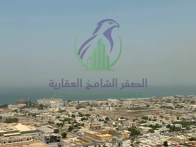 شقة غرفتين وصالة للإيجار السنوي في الخان الشارقة بلكونتين باركينغ مجاني جيم أربع دفعات موقع مميز قريب من دبي