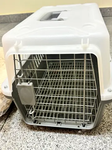 Small plastic pet carrier with metal door , pet bed, pet water dispenser, pet accessories