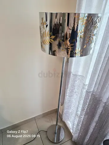 Silver decorative floor lamp with patterned drum shade